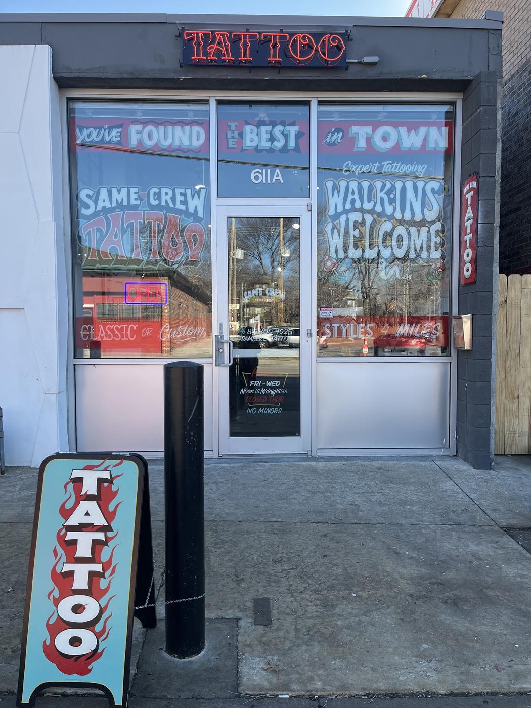 The hand-painted storefront of Same Crew Tattoo at 611A W 39th St, with Walk-Ins Welcome lettered on the window